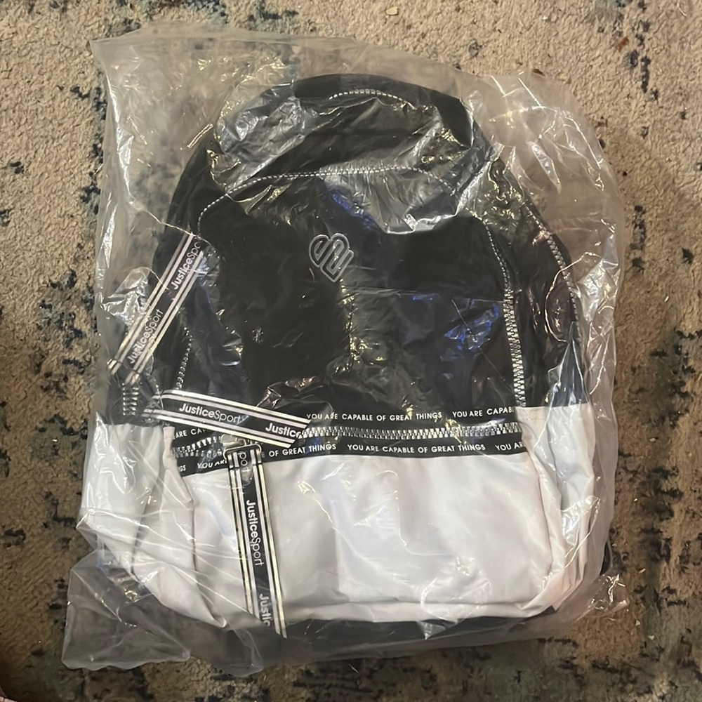 Brand new full size Justice backpack